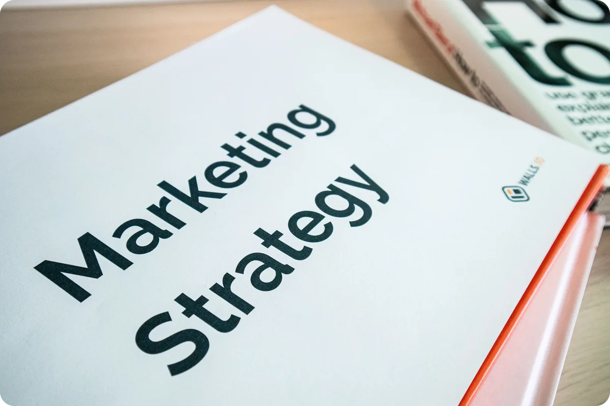 A printed marketing strategy document on a desk